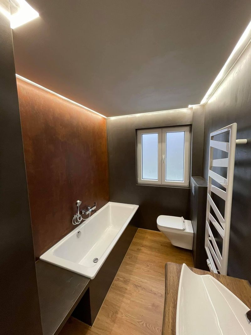 fugenlose-badgestaltung-badsanierung-industrielook-loft-mit-rost-cortenstahl-und-eicheboden-01